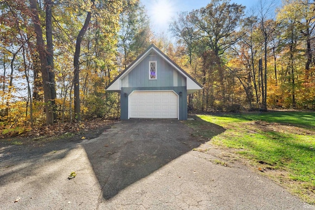 garage with a yard