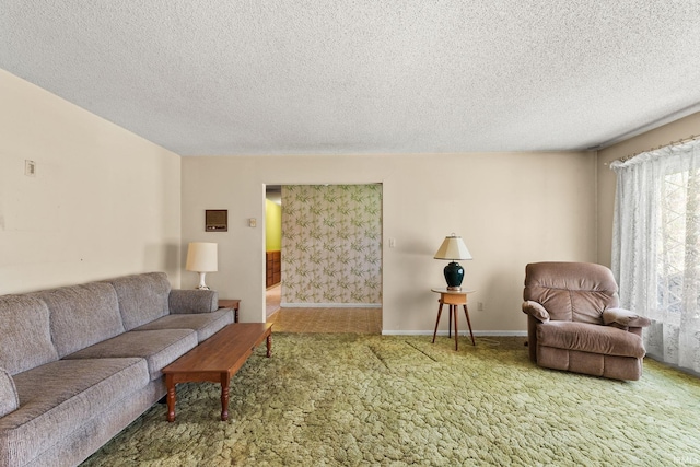 living room with carpet flooring and a textured ceiling