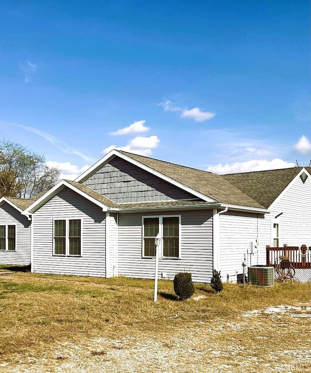 back of house with a yard