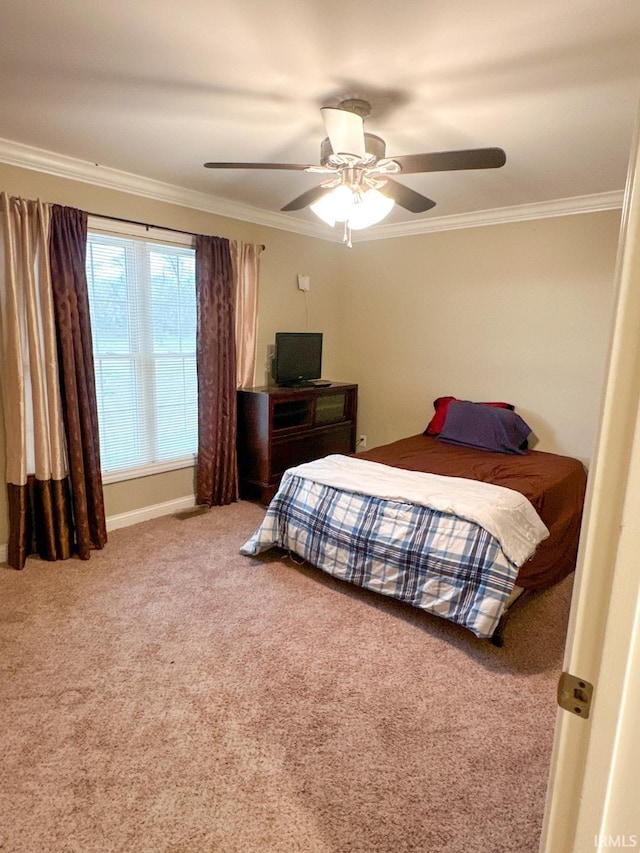 bedroom featuring carpet flooring, ceiling fan, and ornamental molding