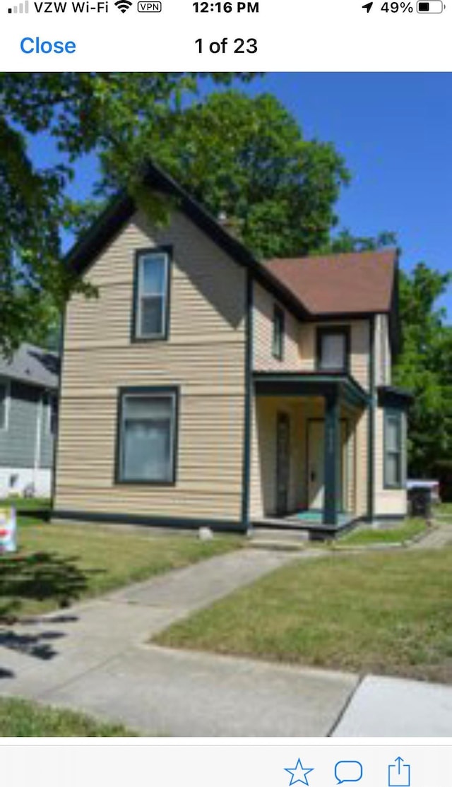 exterior space with a front yard