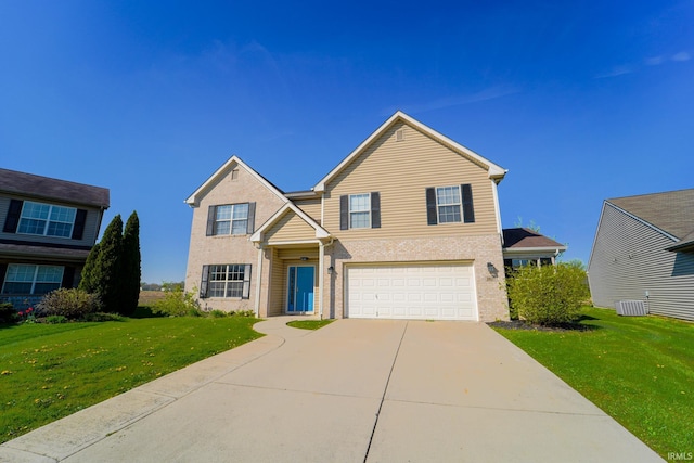 front of property with a garage and a front lawn