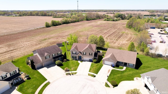 birds eye view of property featuring a rural view