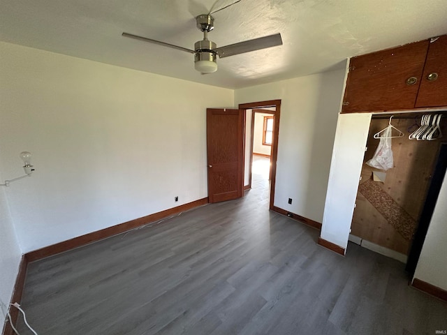 unfurnished bedroom with hardwood / wood-style floors and ceiling fan