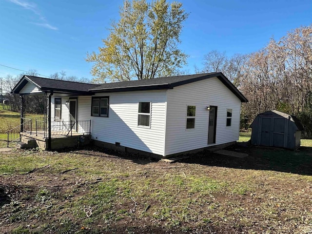 exterior space with a shed