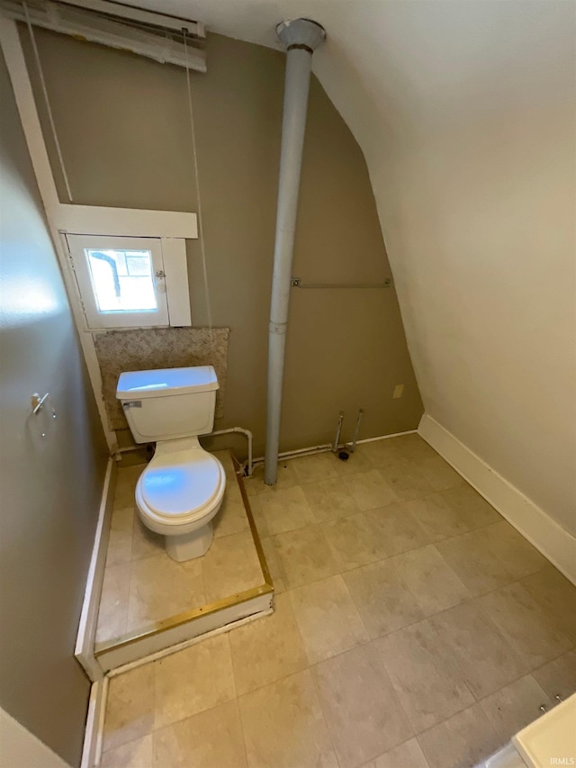 bathroom featuring tile patterned floors and toilet