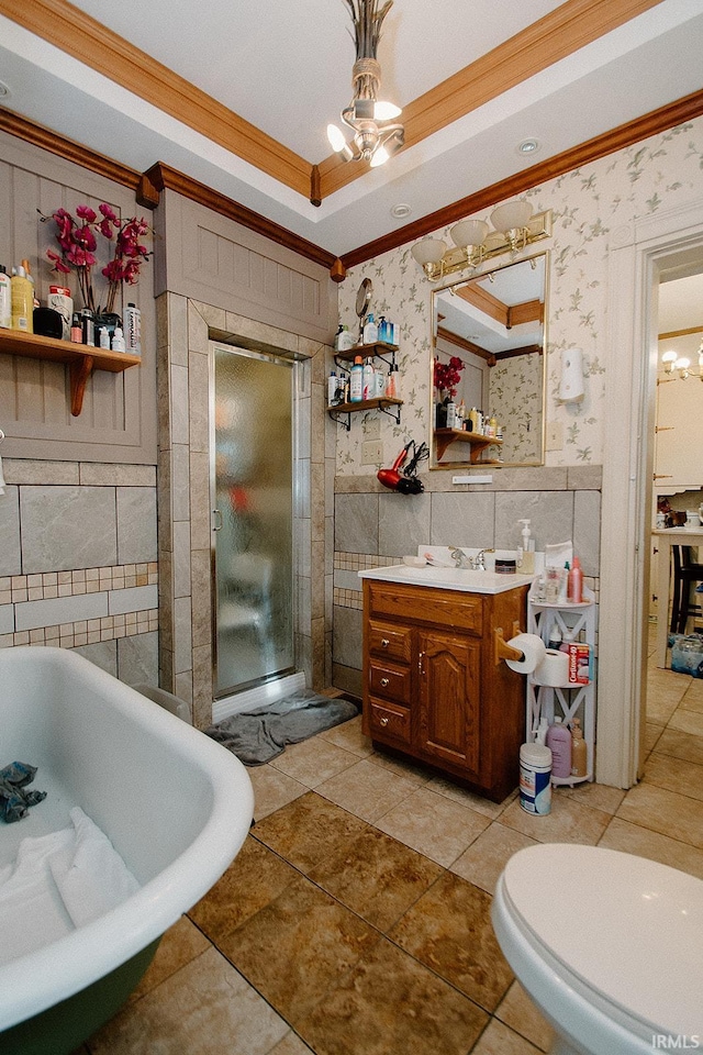 full bathroom with tile patterned flooring, a notable chandelier, ornamental molding, and vanity