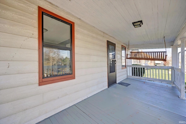 deck with covered porch