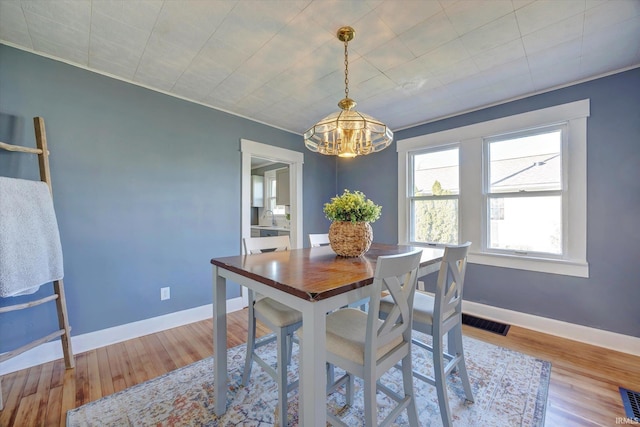 dining area with light wood-type flooring