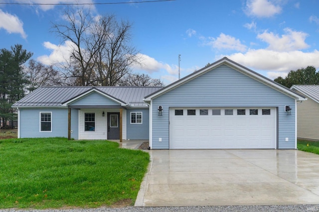 single story home featuring a garage and a front lawn