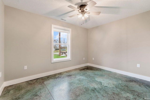 unfurnished room featuring a textured ceiling and ceiling fan