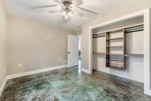 unfurnished bedroom featuring ceiling fan, a closet, and a textured ceiling