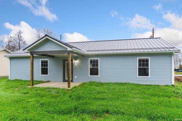 back of house featuring a patio area