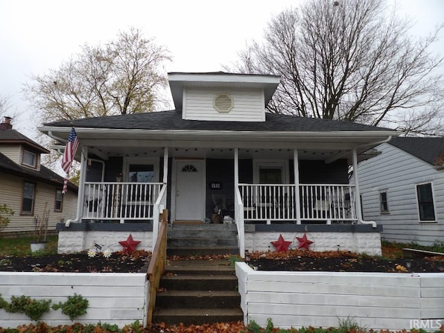 bungalow-style home featuring covered porch