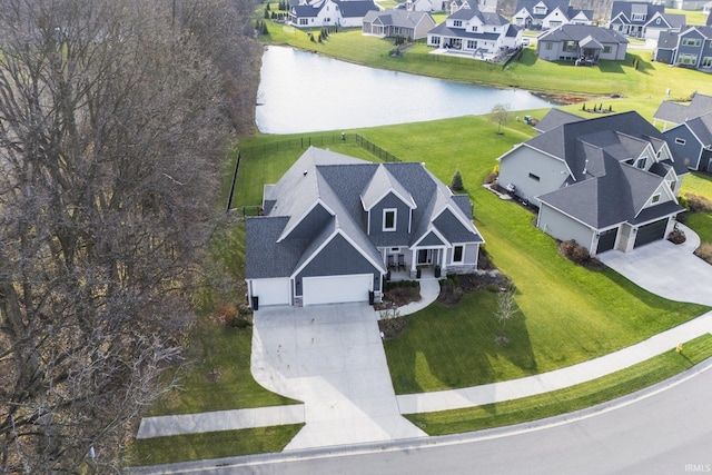 aerial view featuring a water view