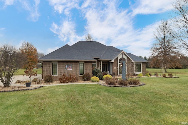 single story home with a front yard