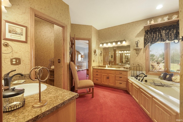 bathroom with a bathtub and vanity