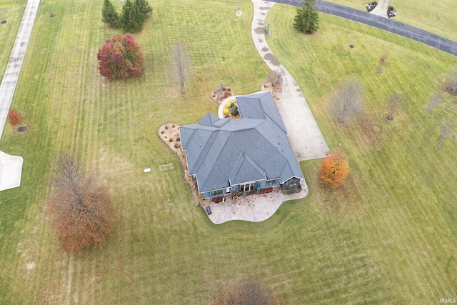 birds eye view of property with a rural view