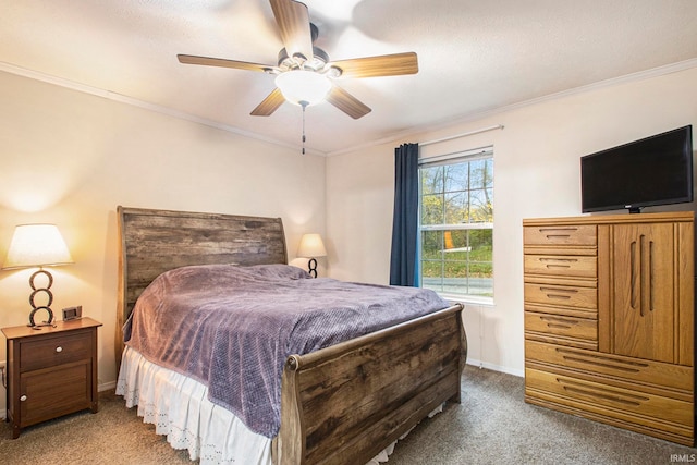 carpeted bedroom featuring ceiling fan and crown molding