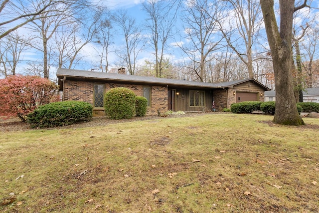 ranch-style house with a front lawn and a garage