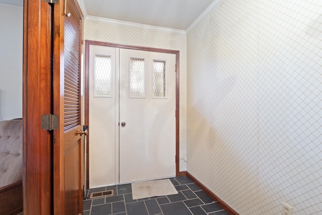 doorway to outside featuring ornamental molding