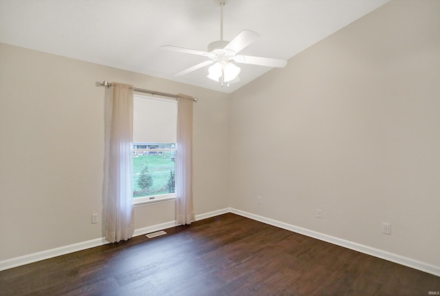 unfurnished room with ceiling fan, lofted ceiling, and dark wood-type flooring