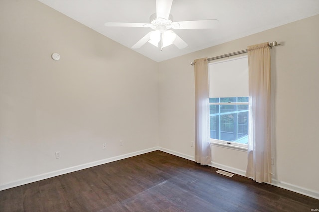 unfurnished room featuring dark hardwood / wood-style floors and ceiling fan