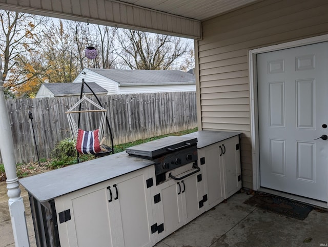 view of patio with exterior kitchen