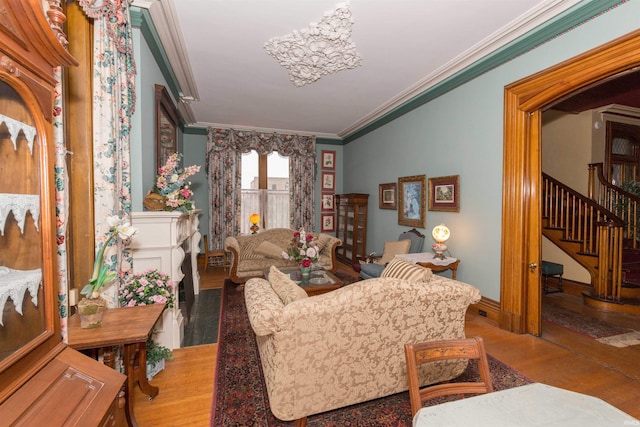 interior space featuring light hardwood / wood-style floors and ornamental molding