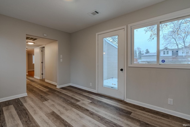 interior space with hardwood / wood-style floors