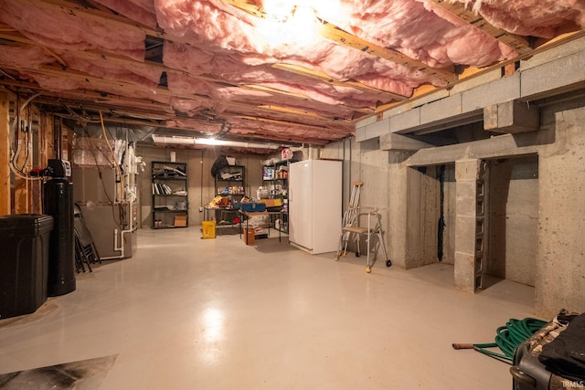 basement featuring heating unit