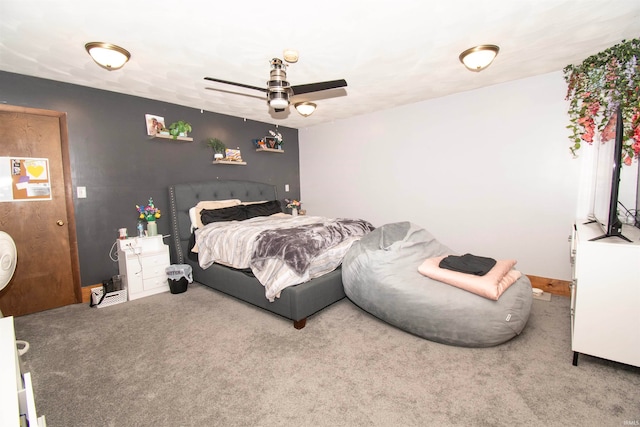 bedroom featuring ceiling fan and carpet floors