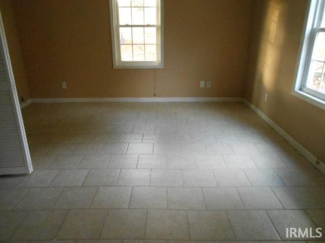 view of tiled empty room