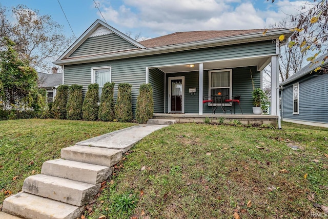 view of front of home featuring a porch and a front lawn