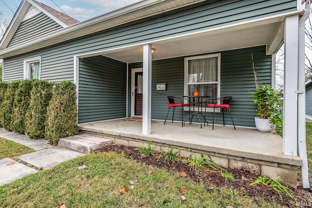 doorway to property with a porch