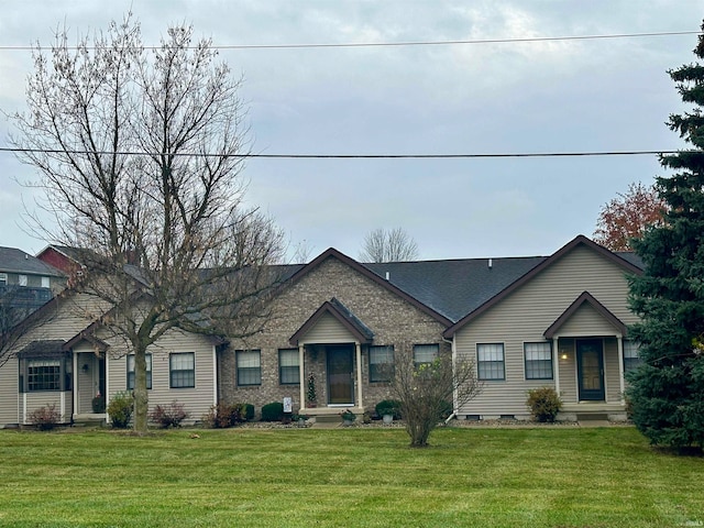 single story home featuring a front lawn