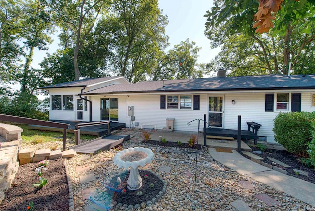 view of front of house with a deck