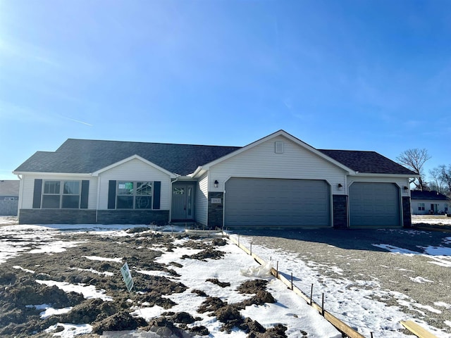 view of front of property featuring a garage