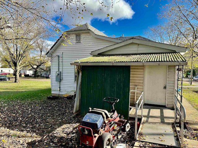 back of house with a yard