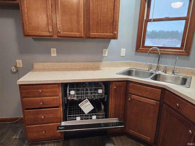 kitchen featuring dark hardwood / wood-style floors and sink