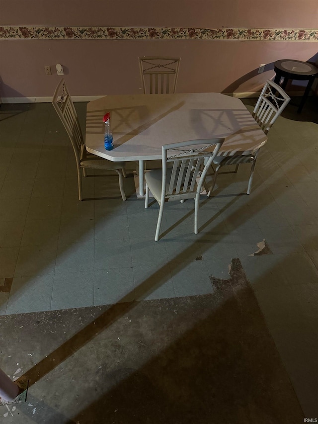 unfurnished dining area with tile patterned floors