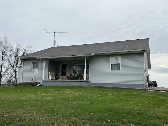 3536 Ridge Rd, Williams, IN 47470 - rear view of house with a porch, a lawn, and roof with shingles