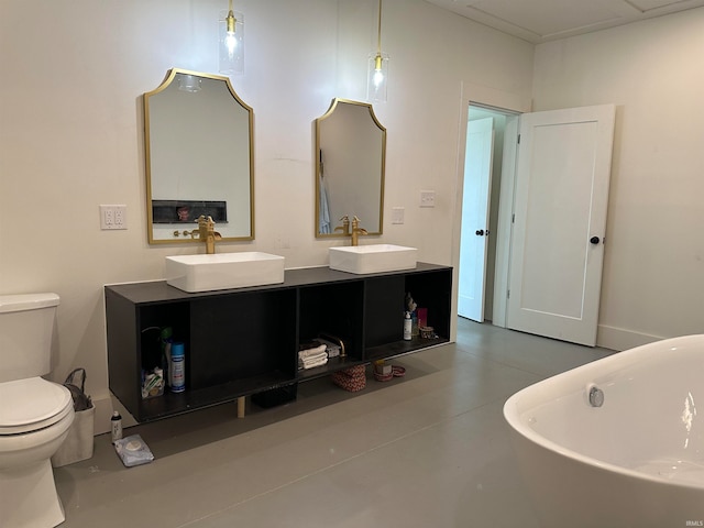 bathroom featuring vanity, toilet, and a bathtub