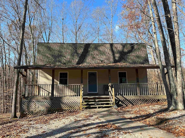 farmhouse inspired home with covered porch