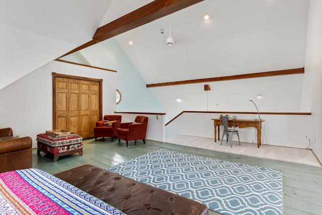 living room with beam ceiling, high vaulted ceiling, and wood-type flooring