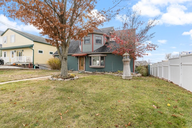 view of front of property with a front lawn