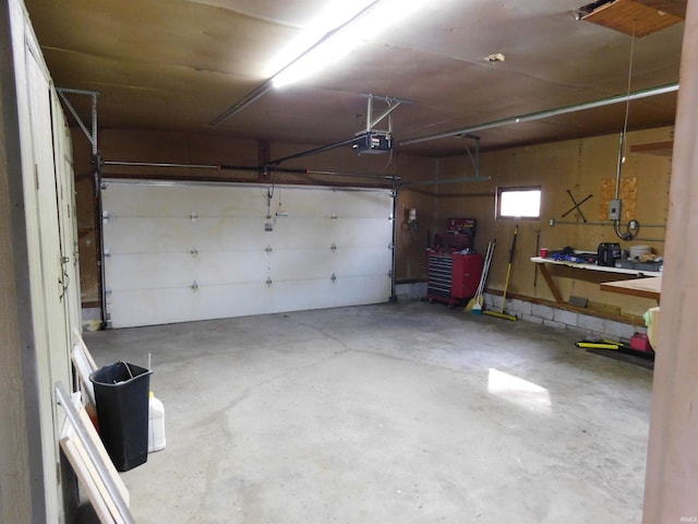 garage featuring a garage door opener