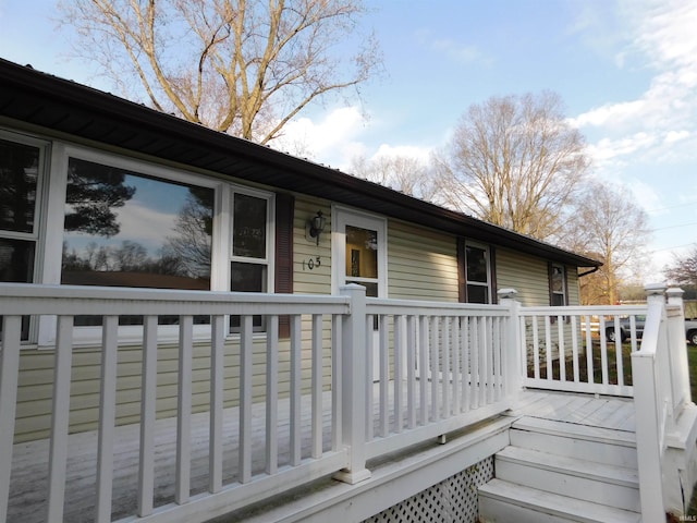 exterior space featuring a wooden deck