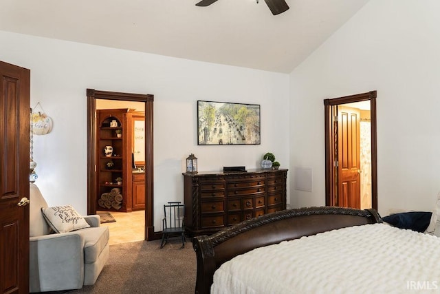 bedroom featuring carpet, vaulted ceiling, and ceiling fan