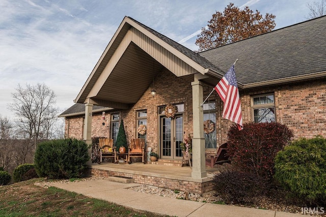 back of property featuring a porch